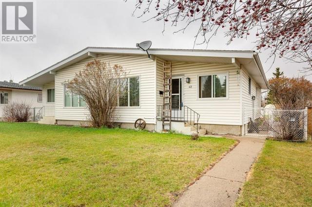 42 Stewart Street, House semidetached with 3 bedrooms, 1 bathrooms and 2 parking in Red Deer AB | Card Image