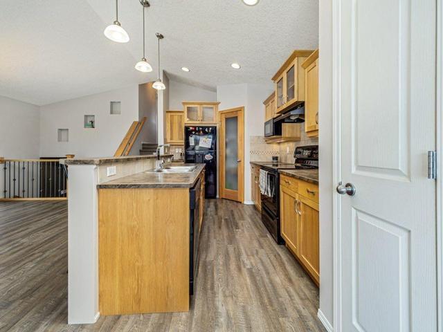 140 Jessie Robinson Close N, House detached with 4 bedrooms, 2 bathrooms and 3 parking in Lethbridge AB | Image 15
