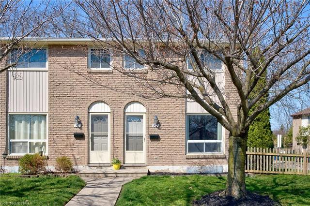 82 - 25 Linfield Drive, House attached with 3 bedrooms, 2 bathrooms and 1 parking in St. Catharines ON | Image 1