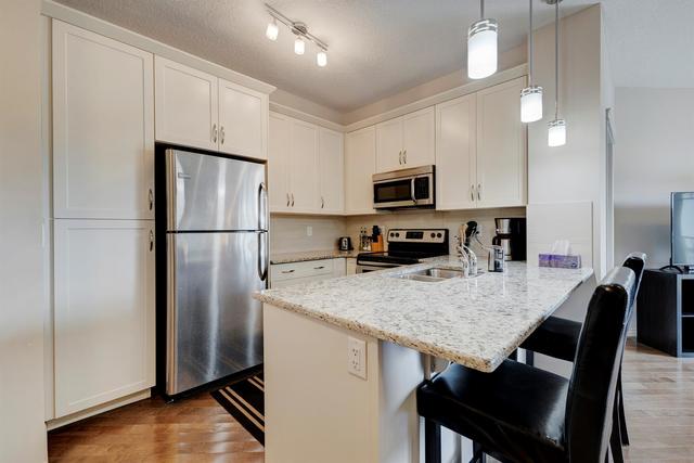 2409 - 130 Panatella Street Nw, Condo with 2 bedrooms, 1 bathrooms and 1 parking in Calgary AB | Image 1