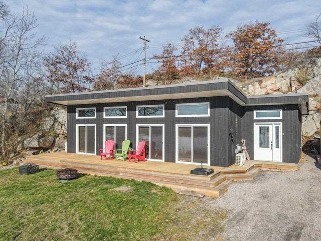 1083 Riverside Dr, House detached with 2 bedrooms, 1 bathrooms and 4 parking in Parry Sound, Unorganized, Centre Part ON | Card Image