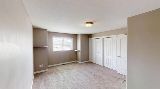 10306 70 Avenue, Home with 2 bedrooms, 2 bathrooms and null parking in Grande Prairie AB | Image 8