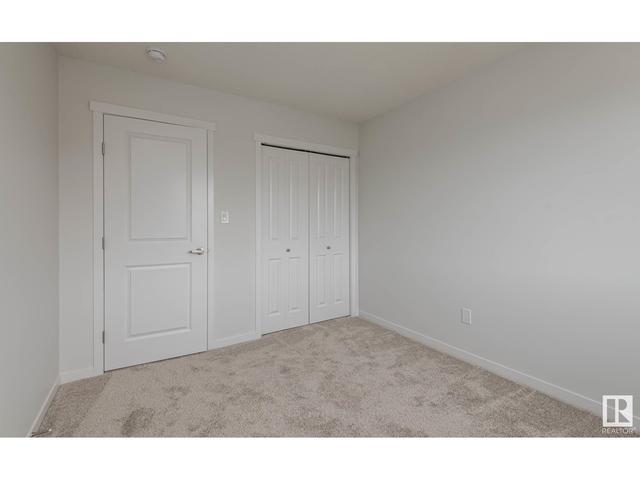 5702 Juchli Av Nw, House attached with 3 bedrooms, 3 bathrooms and null parking in Edmonton AB | Image 16