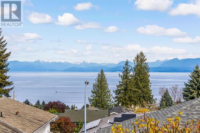 5658 Malibu Terr, House detached with 6 bedrooms, 4 bathrooms and 4 parking in Nanaimo BC | Image 3