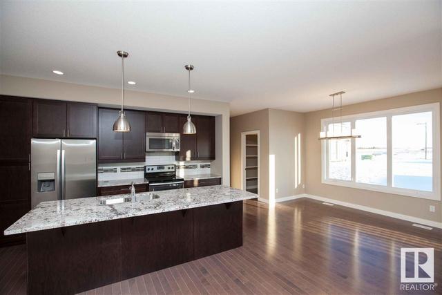 8913 97 Av, House detached with 4 bedrooms, 3 bathrooms and null parking in Morinville AB | Image 5