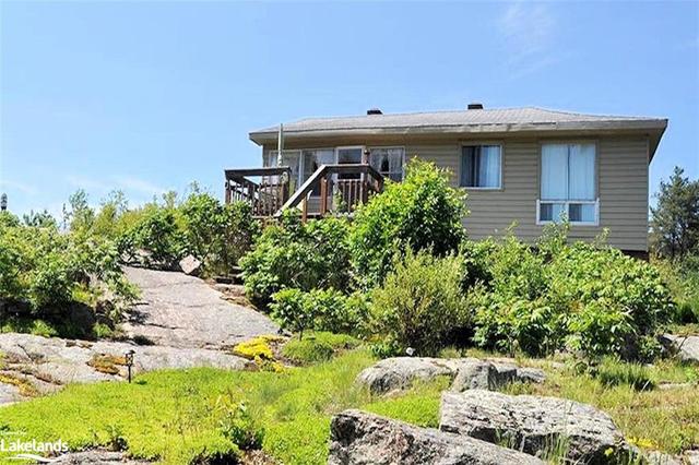 1465 Riverside Drive, House detached with 6 bedrooms, 2 bathrooms and 6 parking in Parry Sound, Unorganized, Centre Part ON | Image 17