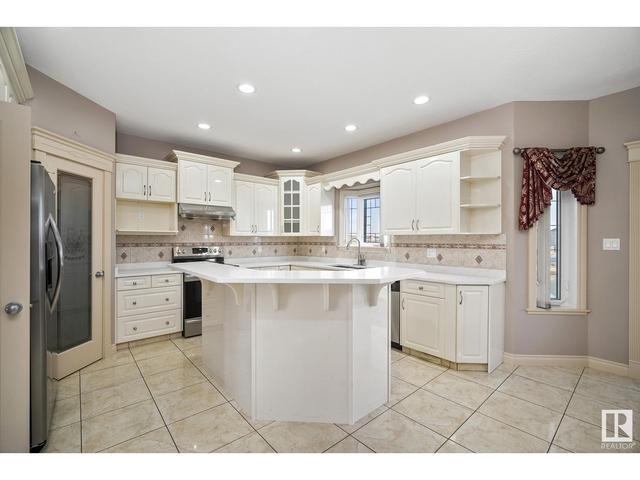 7710 168a Av Nw, House detached with 7 bedrooms, 5 bathrooms and 5 parking in Edmonton AB | Image 13