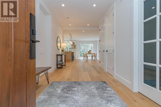 A welcoming grand entrance to real wood floors and an 8' front door w/a triple locking mechanism | Image 7