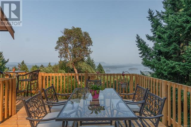 deck is a wonderful place to sit and enjoy the gorgeous views | Image 53
