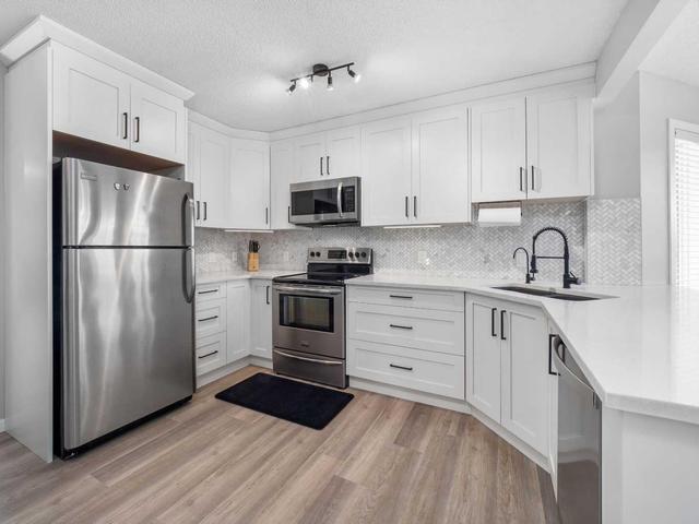 33 Silvergrove Close Nw, Home with 3 bedrooms, 2 bathrooms and 1 parking in Calgary AB | Image 11