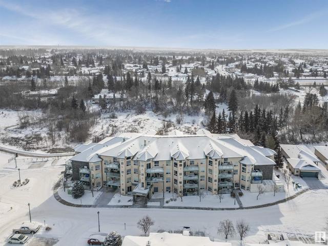 303 - 102a Bridgeport Cx, Condo with 1 bedrooms, 1 bathrooms and null parking in Leduc AB | Image 21