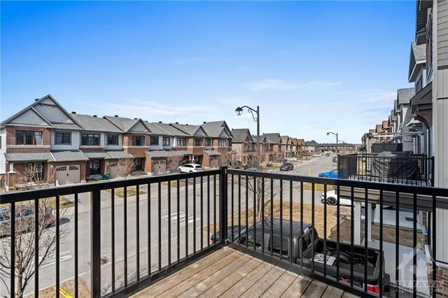 Walkout deck from dining space looking over Sweetwater lane. | Image 17
