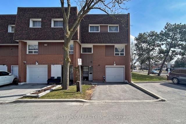 102 - 4 Litchfield Crt, Townhouse with 4 bedrooms, 2 bathrooms and 2 parking in Toronto ON | Image 1