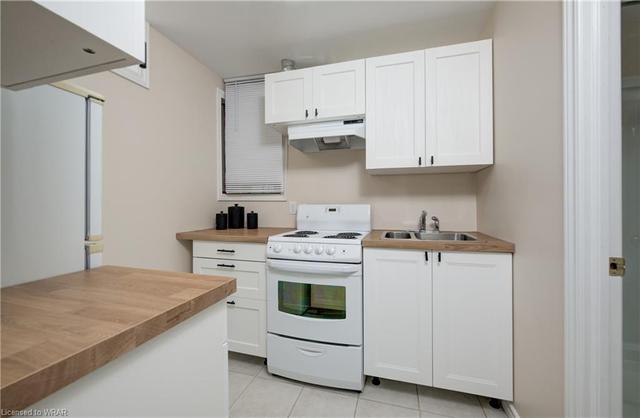 In the basement you’ll discover a fully-equipped 1-bed studio suite with kitchen and large, updated 3-pc bathroom, offering an ideal in-law setup or potential rental opportunity. | Image 10