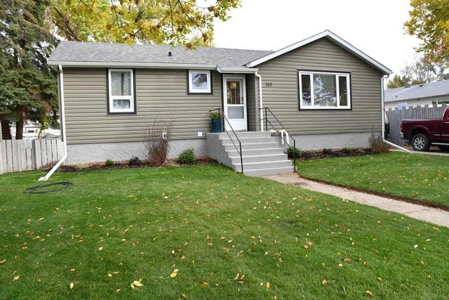 310 3 Avenue N, House detached with 4 bedrooms, 2 bathrooms and 4 parking in Vauxhall AB | Image 1