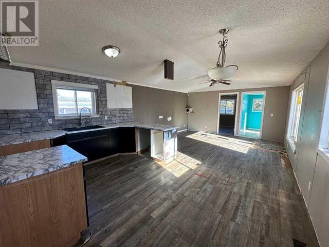 12, - 5211 55 Avenue, House other with 3 bedrooms, 1 bathrooms and 2 parking in Rocky Mountain House AB | Image 2