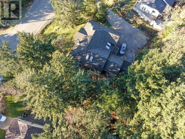 658 Rason Rd, House detached with 5 bedrooms, 4 bathrooms and 5 parking in Langford BC | Image 91