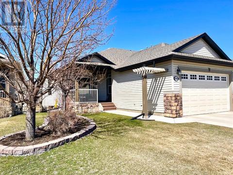 1909 Riverside Drive Nw, House semidetached with 2 bedrooms, 2 bathrooms and 4 parking in High River AB | Card Image