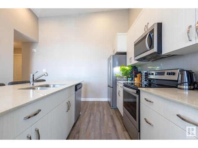 402 - 1506 Tamarack Bv Nw, Condo with 2 bedrooms, 2 bathrooms and 1 parking in Edmonton AB | Image 7
