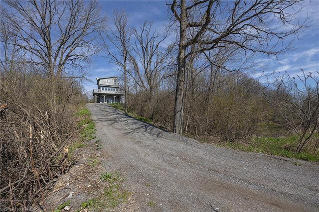 715 County Road 14, House detached with 2 bedrooms, 3 bathrooms and 40 parking in Stone Mills ON | Image 44
