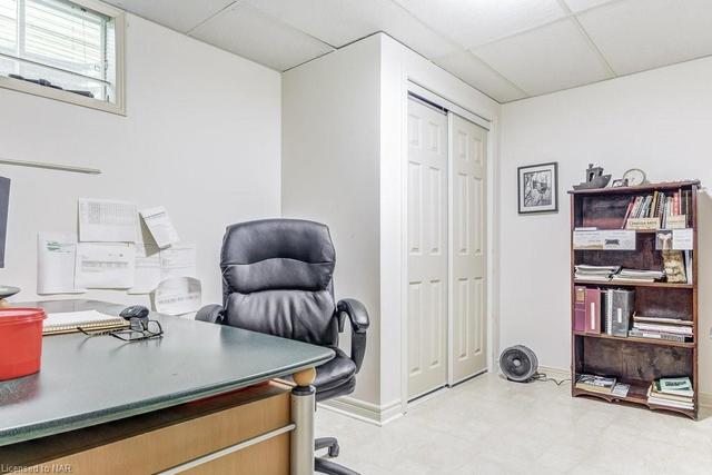 Bdrm in basement used as an office space | Image 19