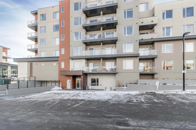 304 - 71 Shawnee Common Sw, Condo with 2 bedrooms, 2 bathrooms and 1 parking in Calgary AB | Image 12