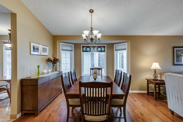 133 Sienna Park Green Sw, Home with 3 bedrooms, 2 bathrooms and 4 parking in Calgary AB | Image 9