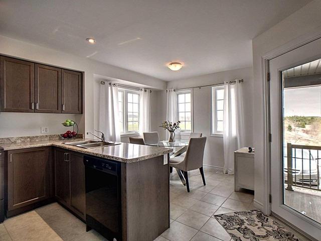1A - 85 Mullin Dr, Townhouse with 0 bedrooms, 2 bathrooms and 1 parking in Guelph ON | Image 11