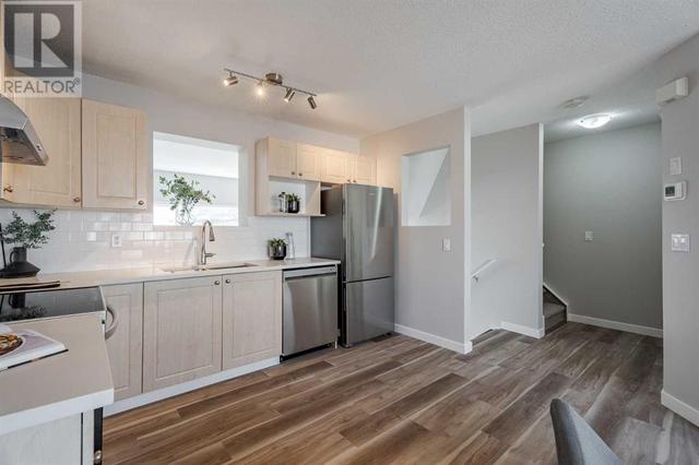 916, - 7038 16 Avenue Se, House attached with 3 bedrooms, 1 bathrooms and 2 parking in Calgary AB | Image 16