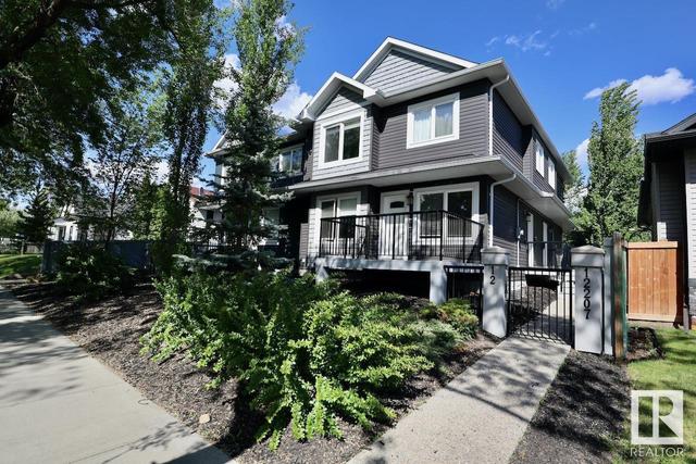 4 - 12207 96 St Nw, House attached with 3 bedrooms, 2 bathrooms and null parking in Edmonton AB | Image 1