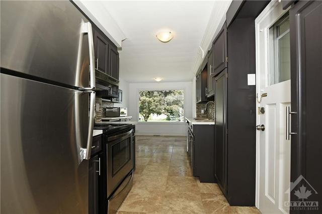 172 Roger Road, House detached with 3 bedrooms, 2 bathrooms and 3 parking in Ottawa ON | Image 13