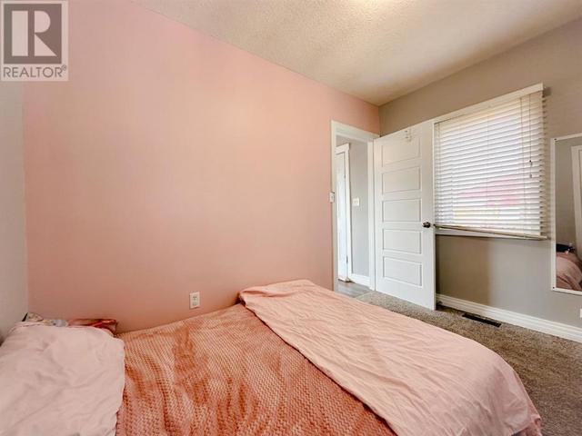 504 1a Avenue E, House detached with 2 bedrooms, 1 bathrooms and 2 parking in Brooks AB | Image 15