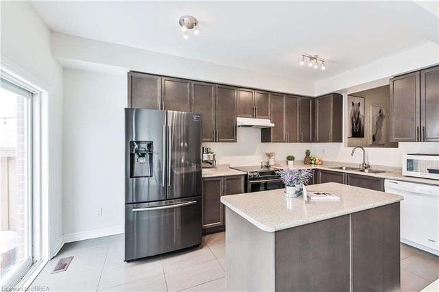 52 Isaac Devins Blvd, House semidetached with 3 bedrooms, 4 bathrooms and 3 parking in Toronto ON | Image 2
