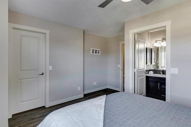 35 Aspen Hills Green Sw, Home with 2 bedrooms, 2 bathrooms and 2 parking in Calgary AB | Image 32