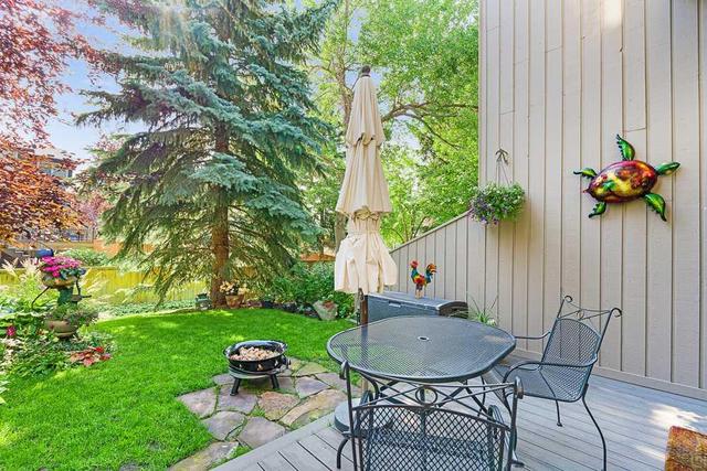 28 Point Mckay Court Nw, Home with 2 bedrooms, 1 bathrooms and 2 parking in Calgary AB | Image 4