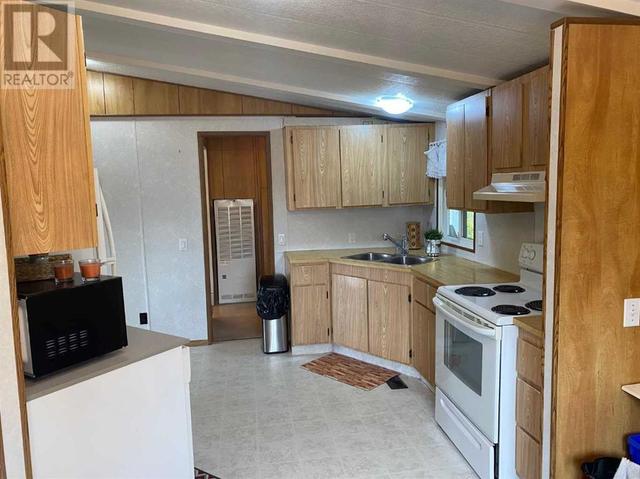 6402 51 Street, House other with 3 bedrooms, 2 bathrooms and 6 parking in Ponoka AB | Image 7
