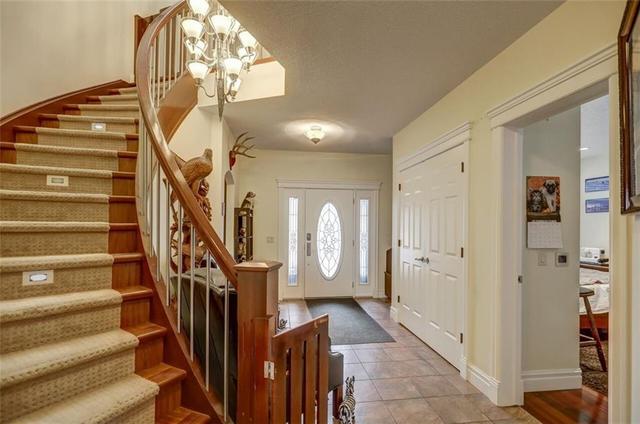 2630 Evercreek Bluffs Way Sw, House detached with 6 bedrooms, 4 bathrooms and 3 parking in Calgary AB | Image 2