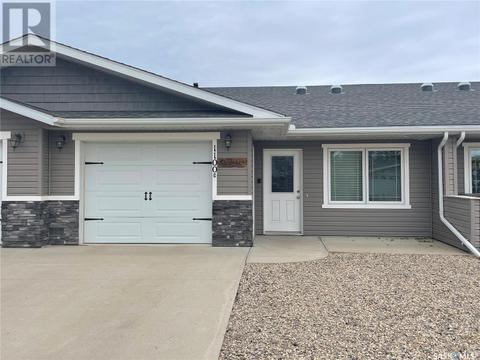 1100 C 95th Avenue, House semidetached with 2 bedrooms, 1 bathrooms and null parking in Tisdale SK | Card Image