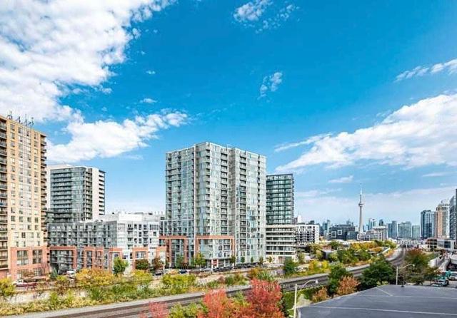 215 - 50 Joe Shuster Way, Townhouse with 3 bedrooms, 3 bathrooms and 1 parking in Toronto ON | Image 1