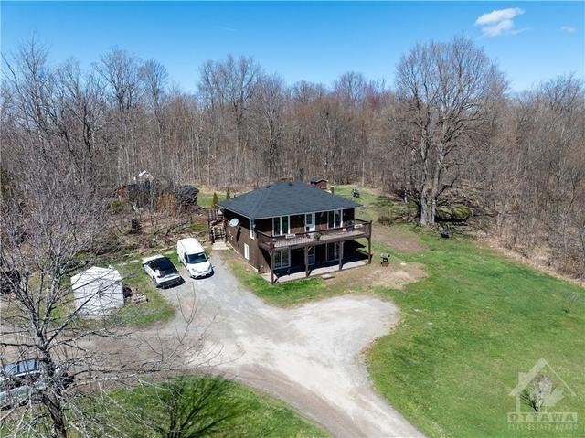 434 Mccann Road, House detached with 2 bedrooms, 2 bathrooms and 15 parking in Rideau Lakes ON | Image 4