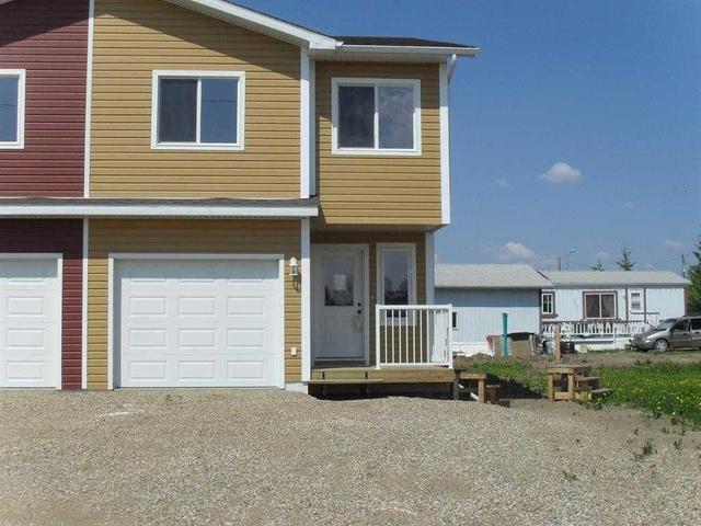 308 3rd Avenue Nw, Home with 3 bedrooms, 2 bathrooms and 1 parking in Manning AB | Image 1