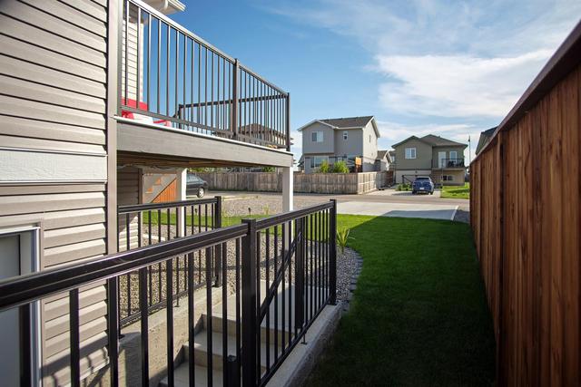 306 Skeena Crescent W, House detached with 2 bedrooms, 2 bathrooms and 3 parking in Lethbridge AB | Image 38