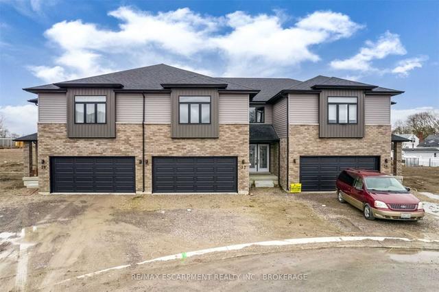 32 Betty Crt, House attached with 4 bedrooms, 3 bathrooms and 4 parking in Chatham Kent ON | Image 1