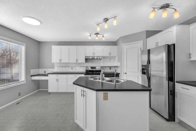 312 Mt Selkirk Close Se, House detached with 4 bedrooms, 2 bathrooms and 4 parking in Calgary AB | Image 8