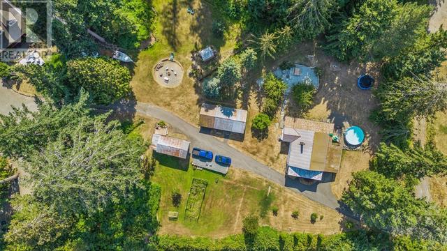 6249 Island Hwy, House detached with 3 bedrooms, 3 bathrooms and 8 parking in Comox Valley A BC | Image 76