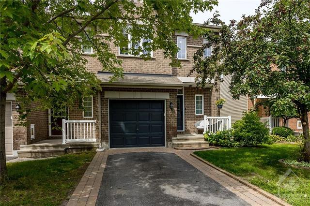 241 Tandalee Crescent, Townhouse with 3 bedrooms, 2 bathrooms and 2 parking in Ottawa ON | Image 1