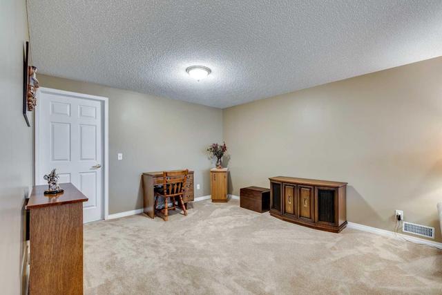 133 Sienna Park Green Sw, Home with 3 bedrooms, 2 bathrooms and 4 parking in Calgary AB | Image 26