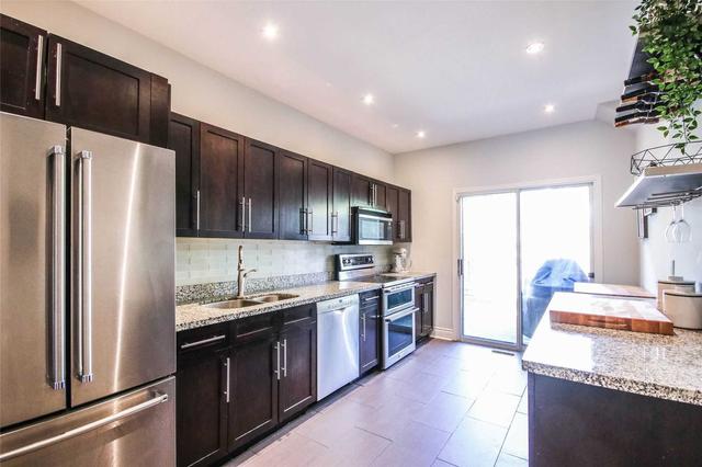 10 Strathmore Blvd, House semidetached with 4 bedrooms, 2 bathrooms and 1 parking in Toronto ON | Image 2