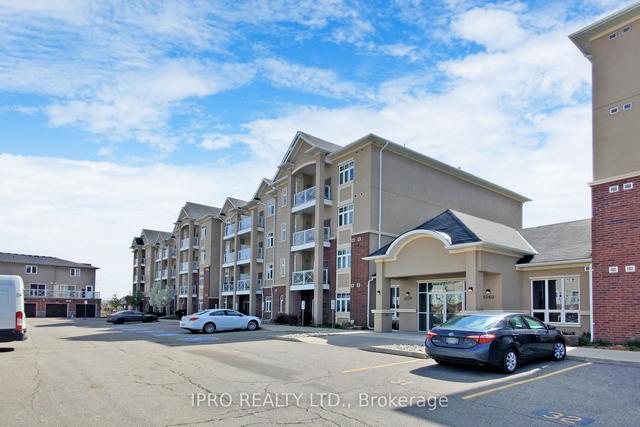 402 - 1370 Costigan Rd, Condo with 2 bedrooms, 2 bathrooms and 1 parking in Milton ON | Image 1