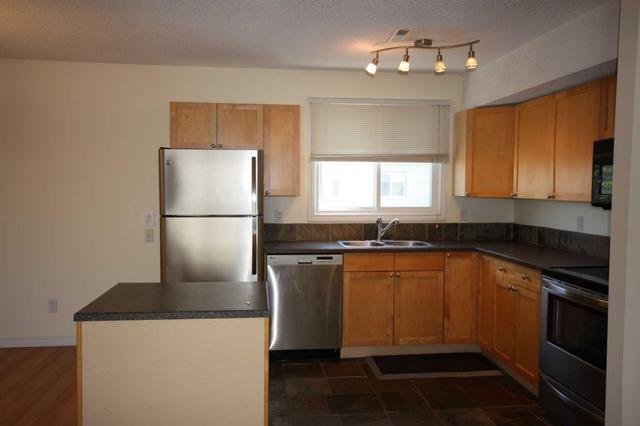 808 - 1540 29 Street Nw, Condo with 2 bedrooms, 1 bathrooms and 1 parking in Calgary AB | Image 9
